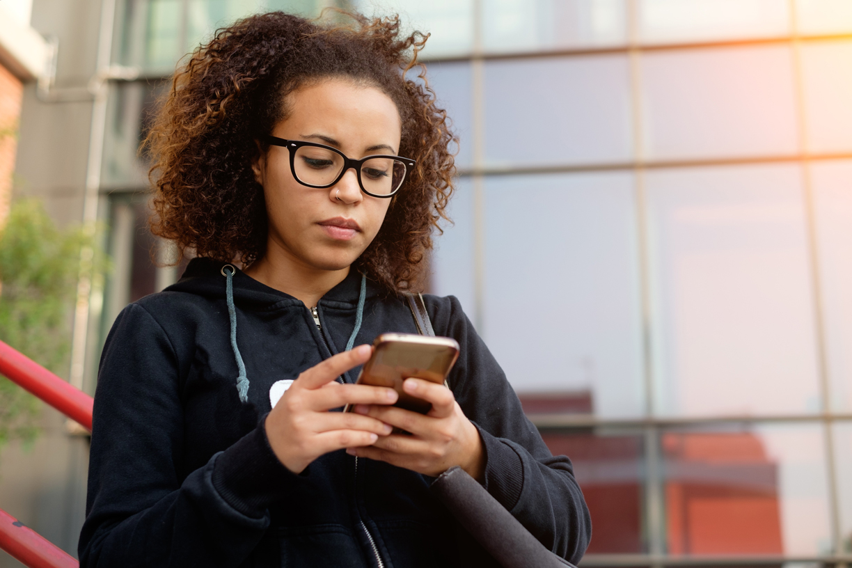 Woman Looking at Phone