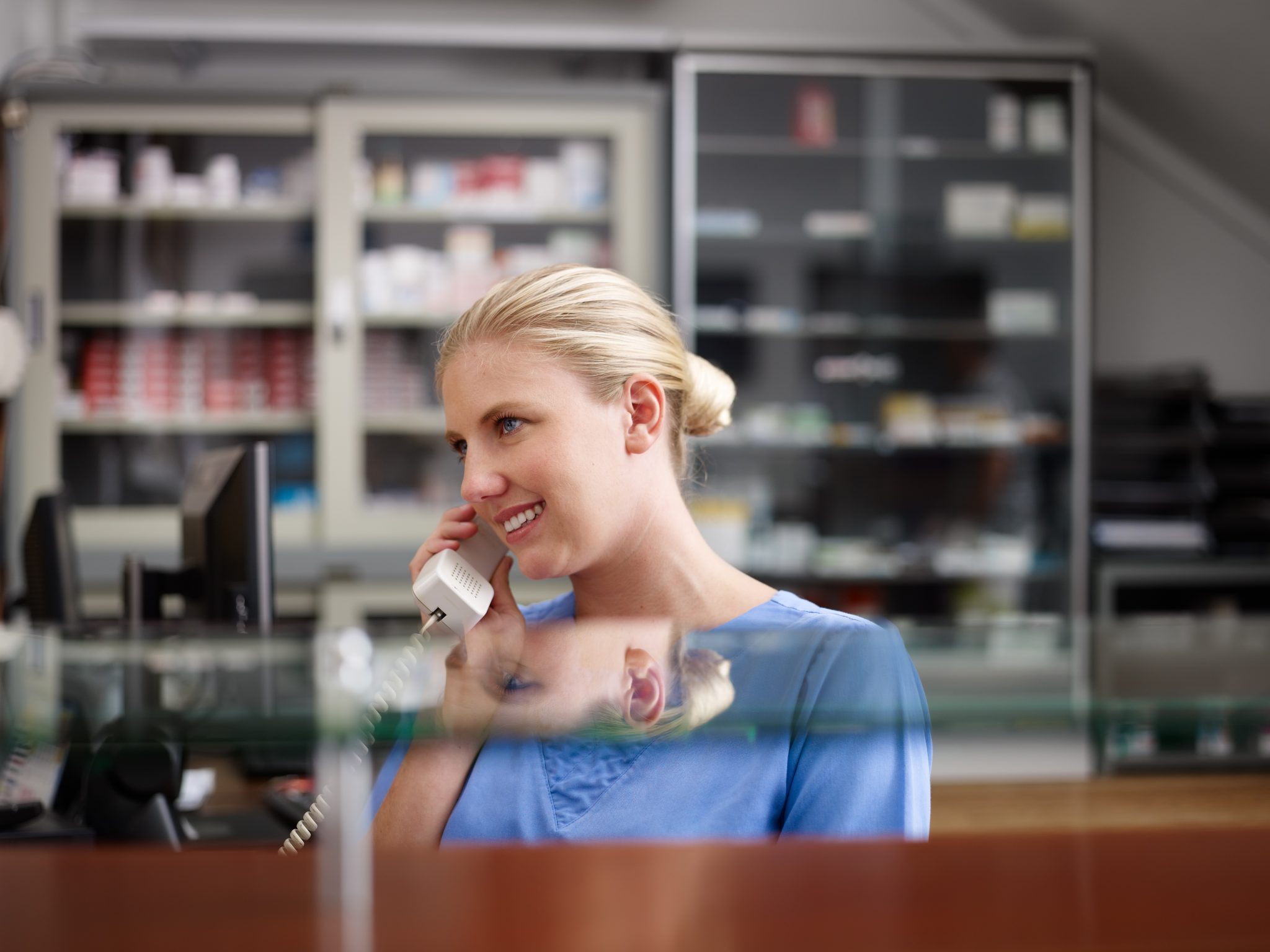 Woman At Work As Receptionist