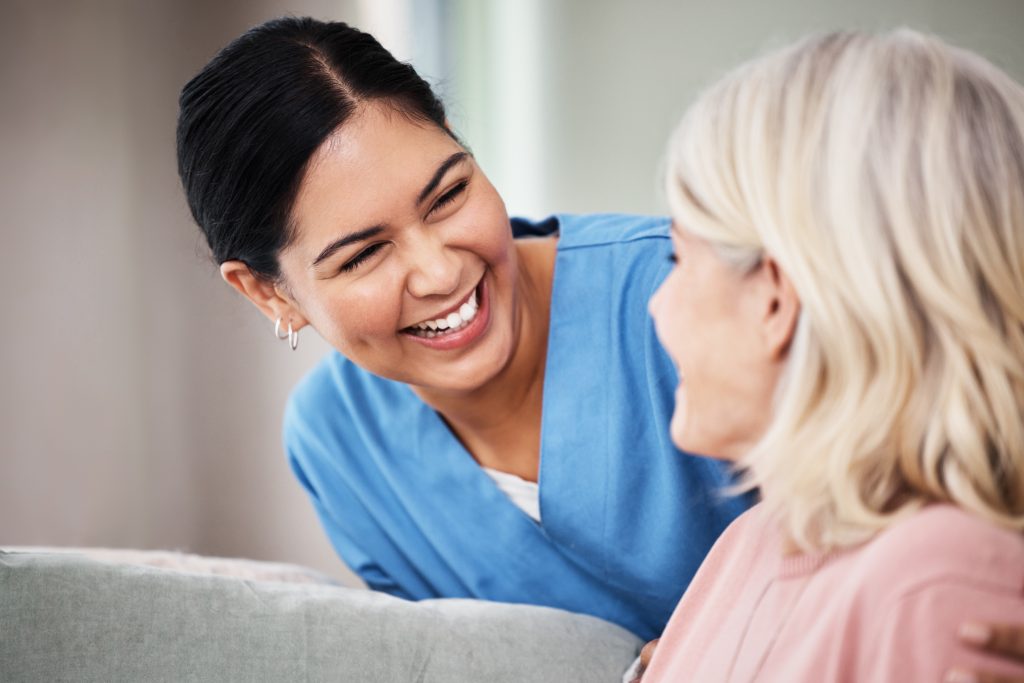 HowAreYouFeelingTodayShotOfAFemaleNurse NUPAS smiling nurse